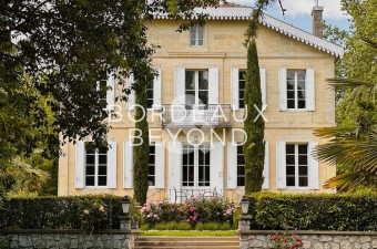 This elegant 1850s Maison de Maître, featuring three bedrooms and three bathrooms, is nestled in picturesque gardens along the river's edge.