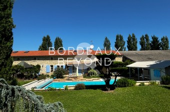 A pretty longère property situated in a quiet location in a small commune close to the popular bastide village of Sauveterre-de-Guyenne.