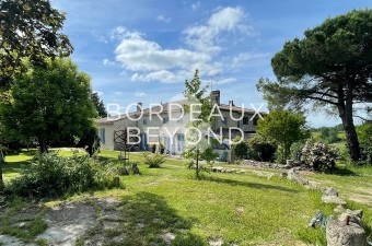 Charming stone property located in the Entre deux Mers region in a lovely, elevated location with beautiful views and pool. This property offers a two bedroom house, a four bedroom house and a studio apartment.